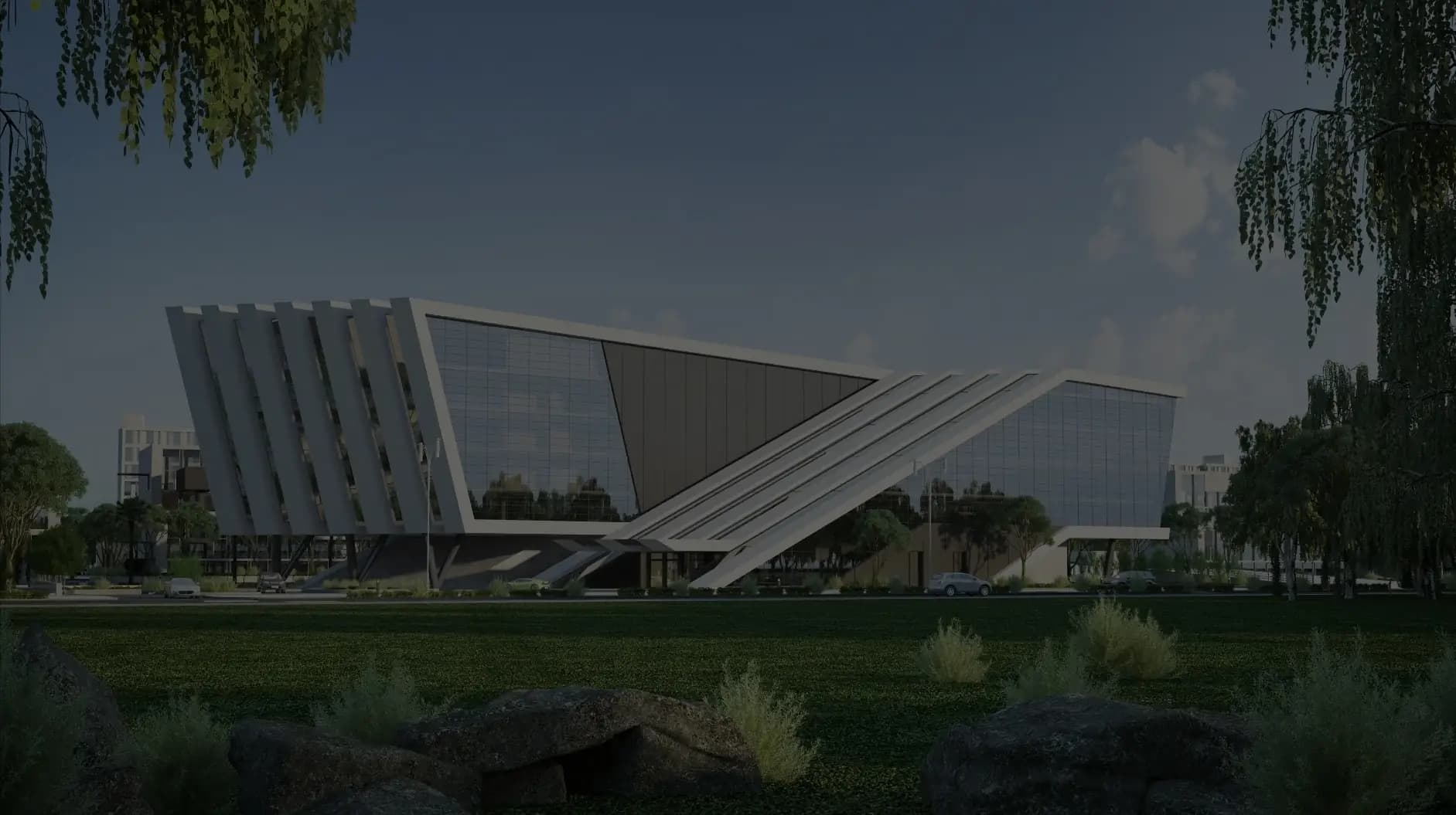 A modern office building with angled white fins