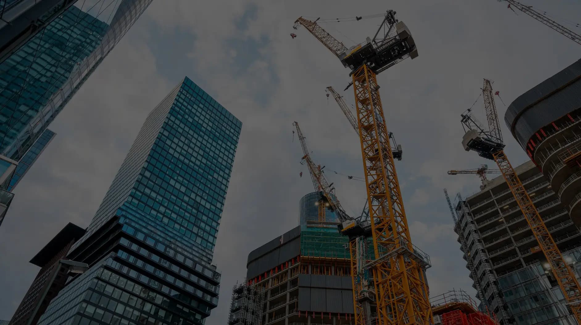 Tower cranes over high-rise buildings under construction